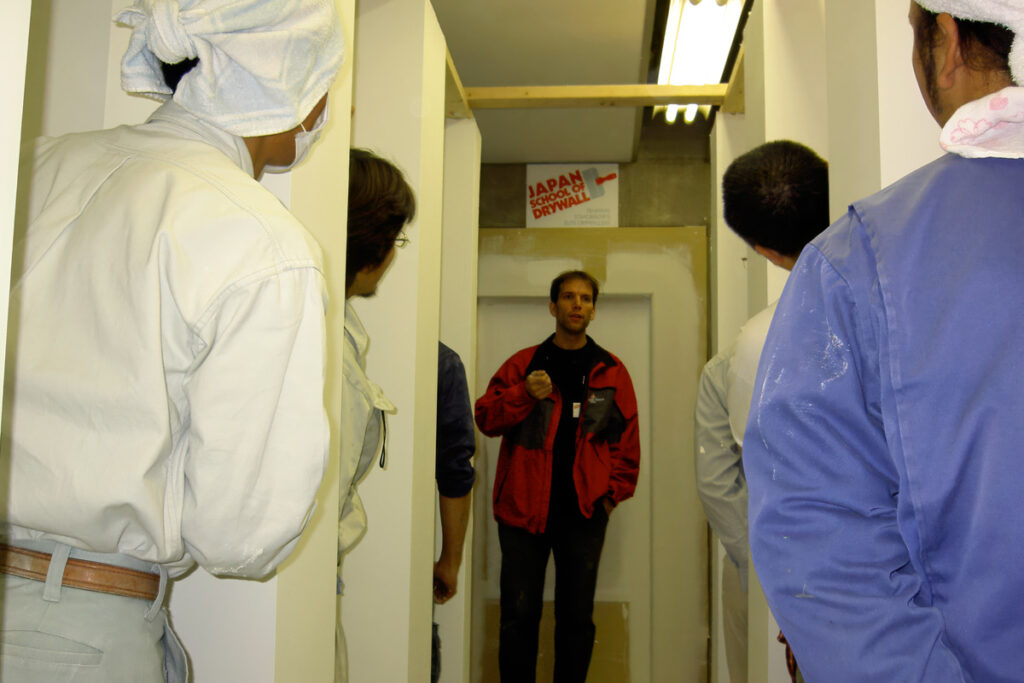 Home Drywall training session at Japan School of Drywall using Toronto School of Drywall methods.